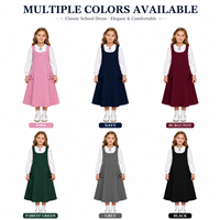 Robe d'uniforme scolaire de haute qualité pour filles, sans manches, à volants et poches, avec bretelles, logo personnalisé, vente en gros OEM ODM