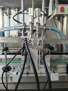 Machine <span class=keywords><strong>de</strong></span> remplissage <span class=keywords><strong>de</strong></span> bouteilles à double tête multifonctionnelle à haute précision pour pâtes, liquides et boissons - Product Image 5