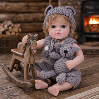 Poupée Reborn de 20 pouces entièrement en vinyle avec chapeau à oreilles d'ours en crochet, barboteuse et jouet ours en crochet, poupée nouveau-né pour jeu d'imitation