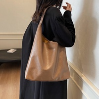 Sac fourre-tout à fermeture éclair en PU de style français vintage pour le travail des femmes sac à bandoulière à sangle unique à la mode de grande capacité de style coréen
