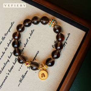 สร้อยข้อมือลูกปัดควอตซ์สโมคกี้ทรงกลมพร้อมจี้ตกแต่งโทนสีทอง - Product Image 4