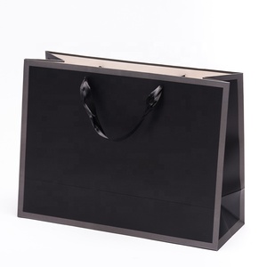 Bolsas de Papel Kraft Personalizadas con Asas Reforzadas, Estilo Liso al por Mayor para Cadenas de Tiendas <span class=keywords><strong>y</strong></span> Actividades de Promoción de Marca - Product Image 1