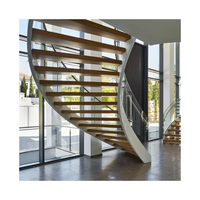 Escalier moderne en bois, pierre et verre, à marches droites, courbes et cercles, de haute qualité
