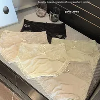 Culottes en dentelle semi-transparente respirante et douce sexy pour femmes, désir pur, satin français subtil, string mi-haut, tricoté