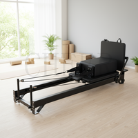 Machine de Pilates Reformer à jambes courtes avec cadre en aluminium, lit de base et résistance réglable, personnalisable pour studio commercial