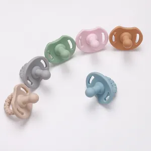 Wholesale Smiling Face Shape Safety Soft Food Grade Silicone Baby Pacifier Natural Rubber Newborn Baby Pacifiers