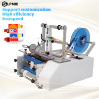 LPMIE Étiqueteuse manuelle portable Applicateur semi-automatique d'étiquettes à surface plane pour boîtes en carton/bouteilles carrées/boîtes de conserve