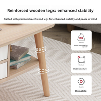 Table basse ovale double couche peu encombrante avec tiroir fermé et étagère ouverte, taille compacte pour salon familial de petite taille