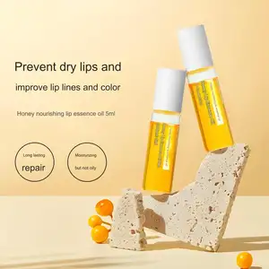 Aceite de esencia de labios nutritivo de miel más popular Lleno y agrandador Acuoso los labios Hidratante Labio Rosa Brillo Plumper Maximizer