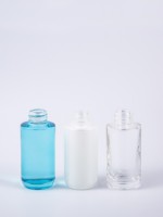 Flacon cosmétique cylindrique en verre silex haute transparence de 30 ml, couleurs personnalisées, pour crème et sérum, avec compte-gouttes et écran.