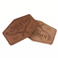 Étiquettes en cuir véritable gaufré de qualité supérieure, personnalisées en usine, pour jeans, chapeaux et sacs.