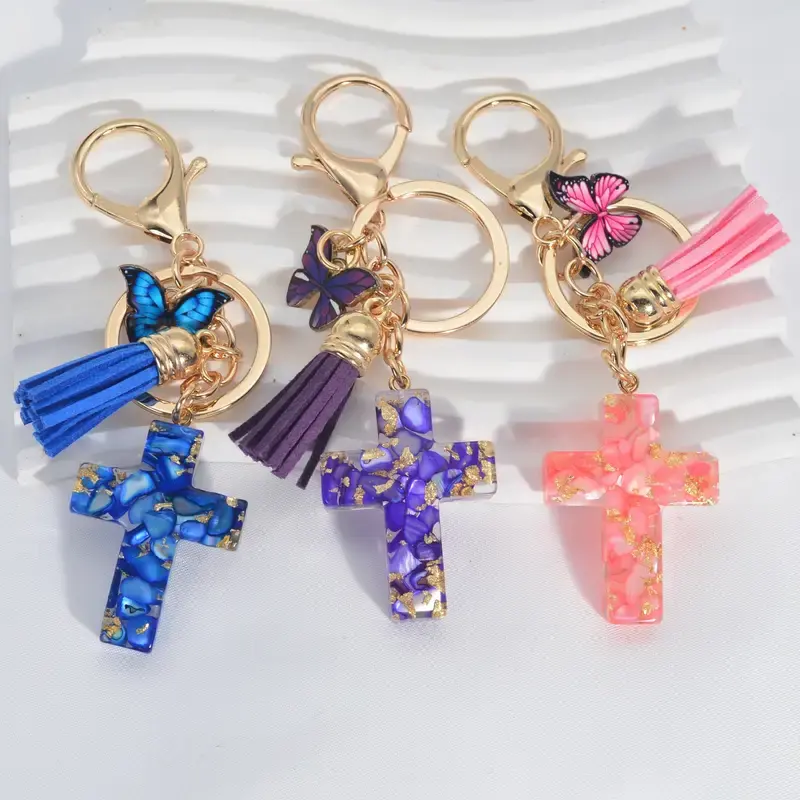 Wholesale New butterfly fringe crystal drop glue stone cross keychain Christian cute resin keychain