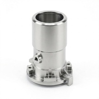 Composant de machine en acier inoxydable moulé par la cire perdue sur mesure avec ports filetés usinés avec précision par CNC