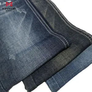 אריג שטוף TC 80% כותנה 20% פוליאסטר 5.4oz בד ג'ינס קל משקל מאוד למכירות חמות בד ג'ינס צבוע שינפויאן קאובוי