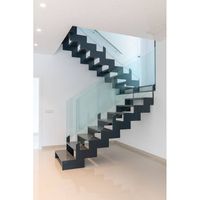 Escalier en colimaçon compact sur mesure pour intérieur, fabriqué en Chine, avec marches en bois et balustrade en acier inoxydable, idéal pour optimiser l'espace.
