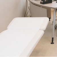 Rouleau de papier d'examen jetable respirant et lisse en gros à prix abordable pour table de massage, couverture de canapé médical et hôpitalier
