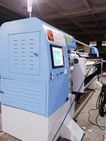 Machine à matelasser informatisée multi-aiguilles pour matelas à points de chaînette