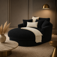 Fauteuil rond moderne en velours côtelé large noir, avec accoudoirs rembourrés, mousse haute densité et structure robuste, pour salon.