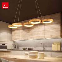Armoires de cuisine en chêne blanc de style minimaliste Alland, avec îlot de cuisine et plan de travail en dalle naturelle lisse