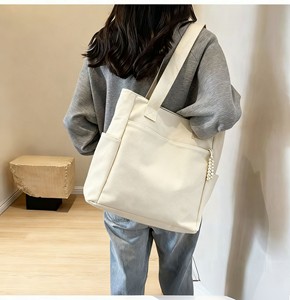 Sac fourre-tout en toile de coton réutilisable et écologique avec logo personnalisé, poche zippée, couleur personnalisée, utilisation promotionnelle pour les étudiantes - Product Image 1