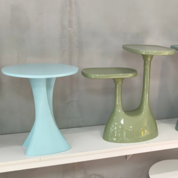 Custom-designed modern fiberglass coffee table, lightweight, durable, and easy to clean, suitable for living rooms and patios