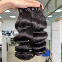Paquets d'extension de cheveux vierges bruts vendeurs de paquets de cheveux humains à vague lâche en gros pour les noirs