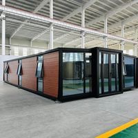 Maison conteneur extensible moderne prête à l'emploi de 30 pieds Villa préfabriquée en acier mobile maison portable 2-5 bureau extérieur