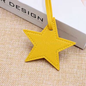 จัดส่งรวดเร็ว พวงกุญแจหนัง PU รูปดาวน่ารัก ของตกแต่งกระเป๋า DIY ของขวัญส่งเสริมการขาย ของขวัญต้อนรับ - Product Image 1