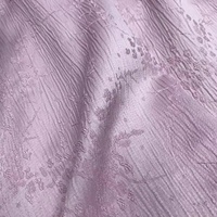 Jacquard en polyester tissé en imitation viscose 250D avec motif de fleur de prunier en relief 3D dimensionnel en relief à texture florale