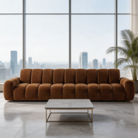 Canapé modulaire en velours brun caramel, design au sol à profil bas capitonné, style Camaleonda pour salon