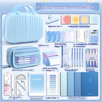 Kit de fournitures scolaires en gros de haute qualité, motif dessin animé bleu mignon, avec sacs cadeaux et stylo