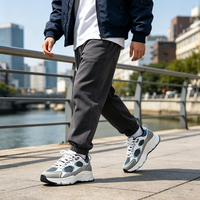 Vente en gros d'usine, baskets pour hommes de luxe décontractées et sportives, avec logo personnalisé, de haute qualité, tendance mode, antidérapantes, résistantes à l'usure, en maille