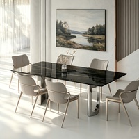Table à manger en marbre de pierre frittée noire, plateau brillant avec base en acier inoxydable chromé, 4 chaises en cuir