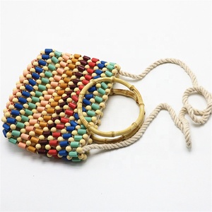 2024 bolso <span class=keywords><strong>de</strong></span> mano multicolor con cuentas multicolor con mango <span class=keywords><strong>de</strong></span> <span class=keywords><strong>madera</strong></span> bolso <span class=keywords><strong>de</strong></span> hombro con cuentas <span class=keywords><strong>de</strong></span> <span class=keywords><strong>ganchillo</strong></span> <span class=keywords><strong>de</strong></span> paja <span class=keywords><strong>para</strong></span> mujer - Product Image 4