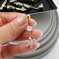 Xinfocus 2026 Nouvelle conception de anneaux de nombril en forme de flocon de neige, acier inoxydable, piercing de nombril plaqué or, bijoux pour femmes et hommes