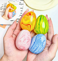 Œuf de Pâques Squishy à Remontée Lente - Jouet à Presser pour Enfants en Sucre de Malt Marbré avec Conception Anti-Stress