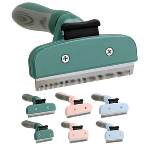 Spazzola dell'affettatrice di toelettatura del cane del gatto dello strumento di despargimento dell'animale domestico autopulente di Logo su ordinazione all'ingrosso della fabbrica - Product Image 1