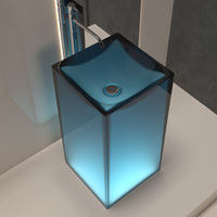 Installation transparente de plancher de pierre de résine de style moderne de conception unique de lavabo. Lavabo indépendant