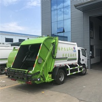 2025 vente chaude 4x2 lecteur 4cbm compacteur camion à ordures Diesel Transmission manuelle avec moteur moteur boîte de vitesses composants de base