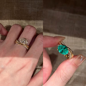 Anillo <span class=keywords><strong>de</strong></span> Compromiso <span class=keywords><strong>de</strong></span> Lujo <span class=keywords><strong>con</strong></span> Circonita Cúbica Paraiba <span class=keywords><strong>de</strong></span> Corte Ovalado para Mujer, Chapado en <span class=keywords><strong>Oro</strong></span> <span class=keywords><strong>de</strong></span> 18K, <span class=keywords><strong>con</strong></span> Banda Ondulada Cruzada y Circonitas Pavé - Product Image 1