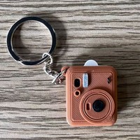 Porte-clés mini-caméra imprimés en 3D populaires pour le dropshipping transfrontalier, pouvant contenir de petites photos, couleurs entièrement personnalisables