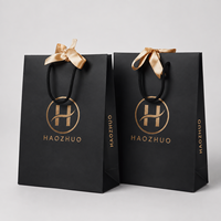Sac de shopping de luxe en carton premium avec logo doré et nœud en satin pour emballage de boutique de cosmétiques – Vente en gros