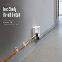 Kabel Serat Optik Indoor Wanbao 4 Core G.657A2 Single Mode Berlapis Baja dengan Spiral Armor Baja Tahan Karat untuk Perkabelan Rumah FTTH