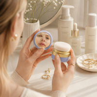 Kosmetik-Puderdose aus Kunststoff mit Goldring-Deckel, Spiegel und Schwammpuff, 5g Fassungsvermögen, Klappdeckel für Haarvolumen-Puder-Aufbewahrung