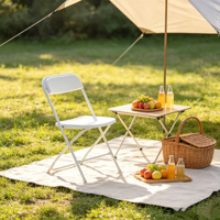 Chaise pliante d'extérieur en plastique blanc pour événements, avec cadre métallique thermolaqué, robuste et pliable, vente en gros