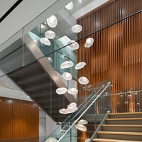 Lustre LED moderne noir et or, luminaire suspendu géométrique pour hôtel à plafond haut, grand lustre long personnalisé en acrylique pour escalier