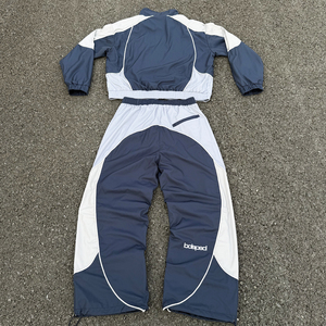 Conjunto de Chándal Rompevientos de Fábrica con Diseño de Nailon Personalizado con Cremallera y Pantalones Holgados para Correr - Product Image 5