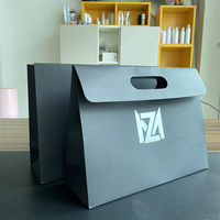 Sacs en papier cadeau de luxe personnalisés avec logo, pour vêtements, avec poignée en ruban