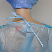 Blouse jetable bleu foncé pour examen hospitalier Blouse d'isolement Vêtements de protection médicale