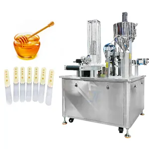 New Designed Automatic Small Honey Double Spoon Filling Machine Honey Liquid Filling Sealing Machine Honey Manufacturer